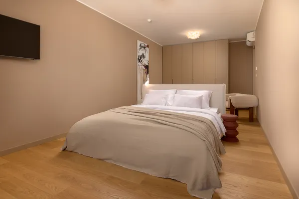 Double bedroom with art and sea view